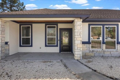 Step inside this 4 bedroom, 2 bath, with an office/flex room on Pine Forest Golf Club in Texas - for sale on GolfHomes.com, golf home, golf lot