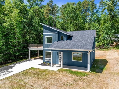 DO IT TODAY AND NOT SOMEDAY! This contemporary newly constructed on The Trail At Chickasaw Pointe in South Carolina - for sale on GolfHomes.com, golf home, golf lot
