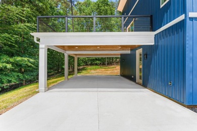 DO IT TODAY AND NOT SOMEDAY! This contemporary newly constructed on The Trail At Chickasaw Pointe in South Carolina - for sale on GolfHomes.com, golf home, golf lot
