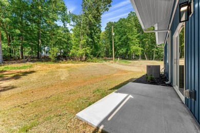DO IT TODAY AND NOT SOMEDAY! This contemporary newly constructed on The Trail At Chickasaw Pointe in South Carolina - for sale on GolfHomes.com, golf home, golf lot