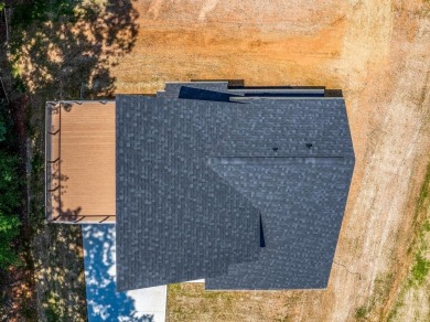 DO IT TODAY AND NOT SOMEDAY! This contemporary newly constructed on The Trail At Chickasaw Pointe in South Carolina - for sale on GolfHomes.com, golf home, golf lot