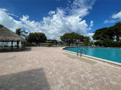 Welcome to this beautifully updated 2-bedroom, 2-bath apartment on Pembroke Lakes Golf Club in Florida - for sale on GolfHomes.com, golf home, golf lot