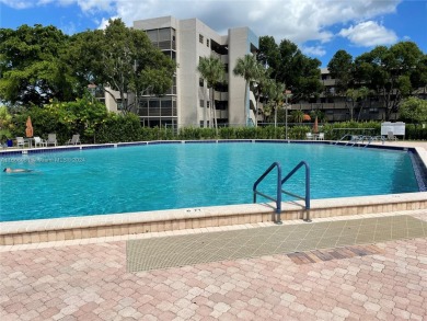 Welcome to this beautifully updated 2-bedroom, 2-bath apartment on Pembroke Lakes Golf Club in Florida - for sale on GolfHomes.com, golf home, golf lot