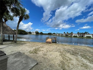 Welcome to this beautifully updated 2-bedroom, 2-bath apartment on Pembroke Lakes Golf Club in Florida - for sale on GolfHomes.com, golf home, golf lot