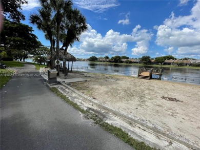 Welcome to this beautifully updated 2-bedroom, 2-bath apartment on Pembroke Lakes Golf Club in Florida - for sale on GolfHomes.com, golf home, golf lot