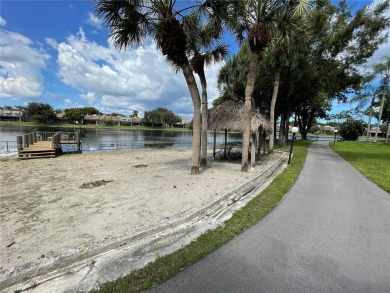 Welcome to this beautifully updated 2-bedroom, 2-bath apartment on Pembroke Lakes Golf Club in Florida - for sale on GolfHomes.com, golf home, golf lot