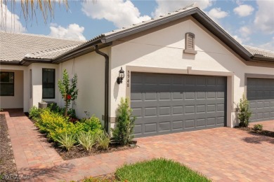 With sweeping views of the water and golf course, this gorgeous on Panther Run Golf Club in Florida - for sale on GolfHomes.com, golf home, golf lot