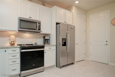 With sweeping views of the water and golf course, this gorgeous on Panther Run Golf Club in Florida - for sale on GolfHomes.com, golf home, golf lot