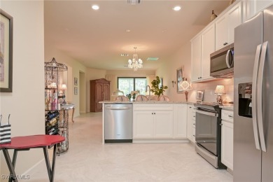With sweeping views of the water and golf course, this gorgeous on Panther Run Golf Club in Florida - for sale on GolfHomes.com, golf home, golf lot