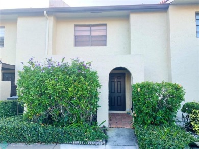 Amazing two bedroom, two and a half bath, guard gated townhouse on Boca Lago Golf and Country Club in Florida - for sale on GolfHomes.com, golf home, golf lot