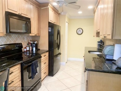 Amazing two bedroom, two and a half bath, guard gated townhouse on Boca Lago Golf and Country Club in Florida - for sale on GolfHomes.com, golf home, golf lot