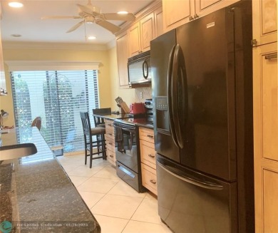 Amazing two bedroom, two and a half bath, guard gated townhouse on Boca Lago Golf and Country Club in Florida - for sale on GolfHomes.com, golf home, golf lot