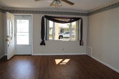 This single-family home located in Unit 2 of Mainlands by the on Mainlands Golf Club in Florida - for sale on GolfHomes.com, golf home, golf lot