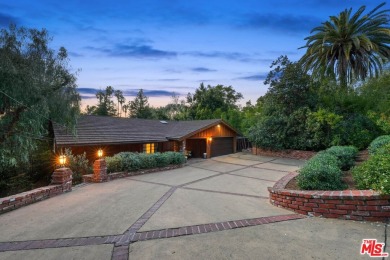 Nestled in the heart of Woodland Hills, this exceptional on Woodland Hills Country Club in California - for sale on GolfHomes.com, golf home, golf lot