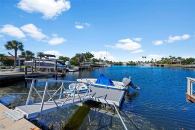 Experience the perfect blend of coastal charm and modern comfort on Gulf Harbors Golf Course in Florida - for sale on GolfHomes.com, golf home, golf lot