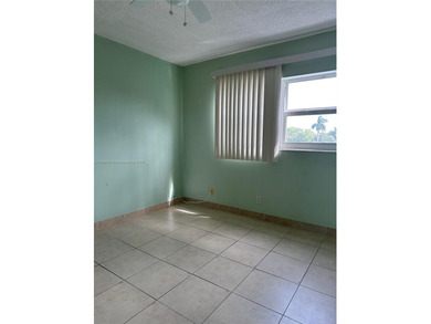 This 2 bed/2 bath condo offers comfort and convenience in an on Eco Golf Club in Florida - for sale on GolfHomes.com, golf home, golf lot