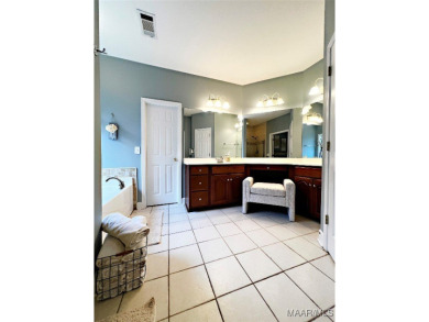 Located on a private golf course lot with a pond in the back on Emerald Mountain Golf Course in Alabama - for sale on GolfHomes.com, golf home, golf lot