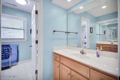 Welcome to this stunning home located in the sought-after golf on Beau Rivage Golf and Resort in North Carolina - for sale on GolfHomes.com, golf home, golf lot