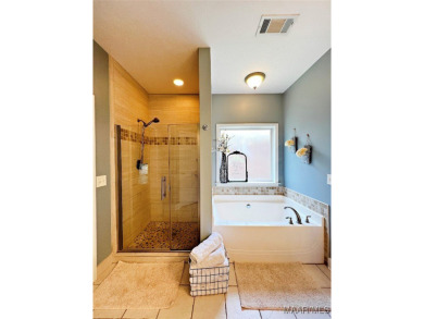 Located on a private golf course lot with a pond in the back on Emerald Mountain Golf Course in Alabama - for sale on GolfHomes.com, golf home, golf lot