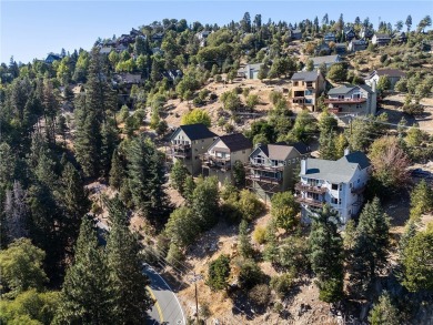 Nestled in the serene Lake Arrowhead woods, this stunning 3,040 on Lake Arrowhead Country Club in California - for sale on GolfHomes.com, golf home, golf lot