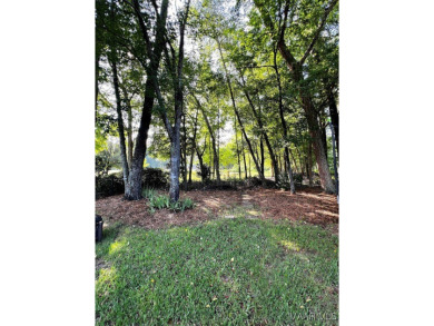 Located on a private golf course lot with a pond in the back on Emerald Mountain Golf Course in Alabama - for sale on GolfHomes.com, golf home, golf lot