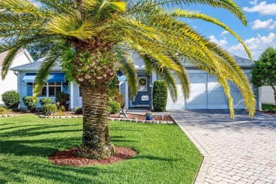The look and style of the tropics are evident as you approach on Amberwood Executive Golf Course in Florida - for sale on GolfHomes.com, golf home, golf lot