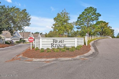 Welcome to this stunning home located in the sought-after golf on Beau Rivage Golf and Resort in North Carolina - for sale on GolfHomes.com, golf home, golf lot