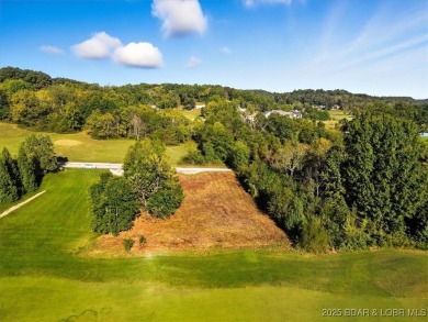 Build your dream home on this .50-acre flat lot located directly on Osage National Golf Club in Missouri - for sale on GolfHomes.com, golf home, golf lot
