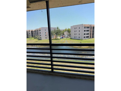REDUCED TO SELL- LOWEST PRICED 2/1.5 
 Fabulous condo in PHASE on Sunrise Lakes Phase IV Golf Course in Florida - for sale on GolfHomes.com, golf home, golf lot