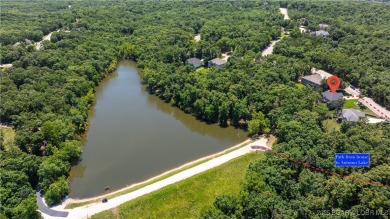 Immaculate Four Seasons home situated on an interior lake! This on Seasons Ridge At Four Seasons in Missouri - for sale on GolfHomes.com, golf home, golf lot