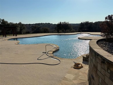 Dreaming of golf course living with small-town charm? At on The Retreat in Texas - for sale on GolfHomes.com, golf home, golf lot