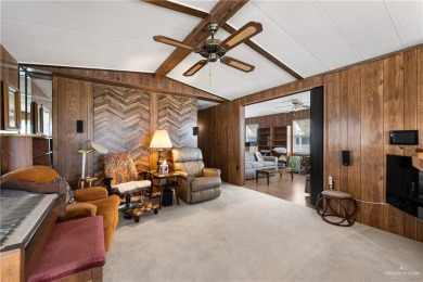 This 2-bedroom, 1.5-bath manufactured home is nestled in a on Howling Trails Golf  in Texas - for sale on GolfHomes.com, golf home, golf lot