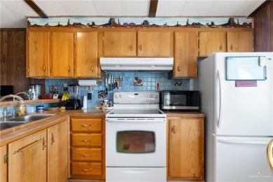 This 2-bedroom, 1.5-bath manufactured home is nestled in a on Howling Trails Golf  in Texas - for sale on GolfHomes.com, golf home, golf lot