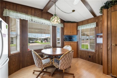 This 2-bedroom, 1.5-bath manufactured home is nestled in a on Howling Trails Golf  in Texas - for sale on GolfHomes.com, golf home, golf lot