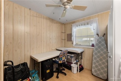 This 2-bedroom, 1.5-bath manufactured home is nestled in a on Howling Trails Golf  in Texas - for sale on GolfHomes.com, golf home, golf lot