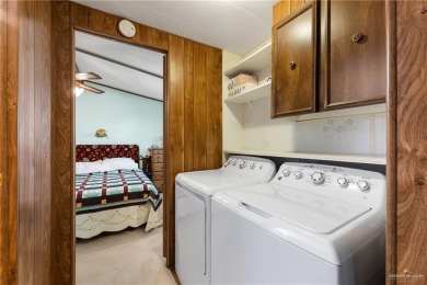 This 2-bedroom, 1.5-bath manufactured home is nestled in a on Howling Trails Golf  in Texas - for sale on GolfHomes.com, golf home, golf lot