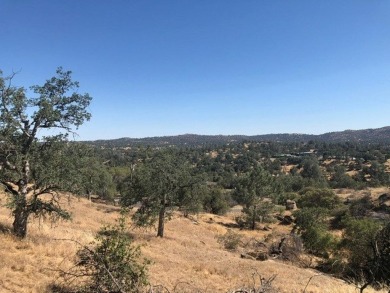 Located on the hilltop this outstanding parcel of 1.51+/- acres on Yosemite Lakes Park Golf Course in California - for sale on GolfHomes.com, golf home, golf lot