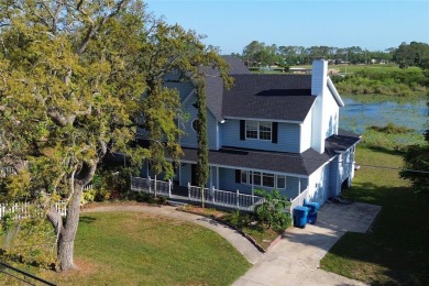 Across the street from a golf course, just off Hunter's Lake on Oak Hills Country Club in Florida - for sale on GolfHomes.com, golf home, golf lot