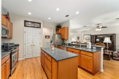 Privacy abounds in this rare and spacious 3-bedroom, 2-bath on Eagle Ridge At Spruce Creek Country Club in Florida - for sale on GolfHomes.com, golf home, golf lot
