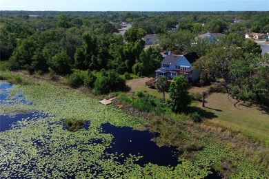 Across the street from a golf course, just off Hunter's Lake on Oak Hills Country Club in Florida - for sale on GolfHomes.com, golf home, golf lot
