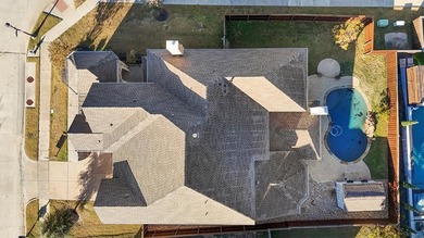 Experience living in this beautifully appointed 4bedroom, 3 on The Tribute At the Colony in Texas - for sale on GolfHomes.com, golf home, golf lot