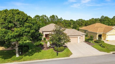 Privacy abounds in this rare and spacious 3-bedroom, 2-bath on Eagle Ridge At Spruce Creek Country Club in Florida - for sale on GolfHomes.com, golf home, golf lot