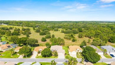 Privacy abounds in this rare and spacious 3-bedroom, 2-bath on Eagle Ridge At Spruce Creek Country Club in Florida - for sale on GolfHomes.com, golf home, golf lot