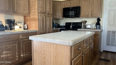 Looking for a ground set with everything done for you? This is on Sun City Riverview Golf Course in Arizona - for sale on GolfHomes.com, golf home, golf lot