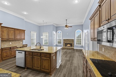 Discover elegance and comfort in this stunning home nestled in on Traditions of Braselton Golf Club in Georgia - for sale on GolfHomes.com, golf home, golf lot