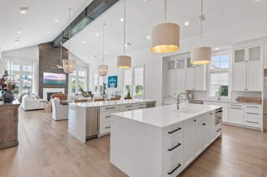Welcome to 298 Corinthian Place, where elegance meets on Regatta Bay Golf and Country Club in Florida - for sale on GolfHomes.com, golf home, golf lot