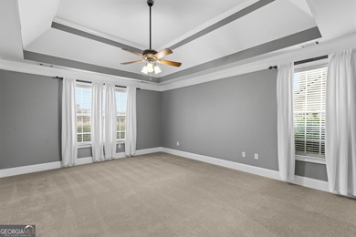 Discover elegance and comfort in this stunning home nestled in on Traditions of Braselton Golf Club in Georgia - for sale on GolfHomes.com, golf home, golf lot