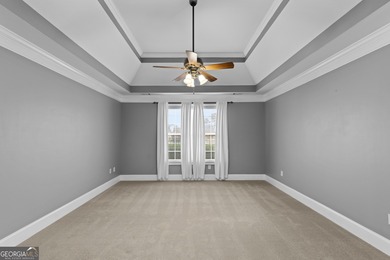 Discover elegance and comfort in this stunning home nestled in on Traditions of Braselton Golf Club in Georgia - for sale on GolfHomes.com, golf home, golf lot