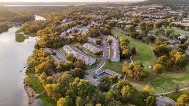 Spacious 4-bedroom, 3-bath condo offering comfort, flexibility on Pointe Royale Village Country Club in Missouri - for sale on GolfHomes.com, golf home, golf lot