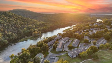 Spacious 4-bedroom, 3-bath condo offering comfort, flexibility on Pointe Royale Village Country Club in Missouri - for sale on GolfHomes.com, golf home, golf lot